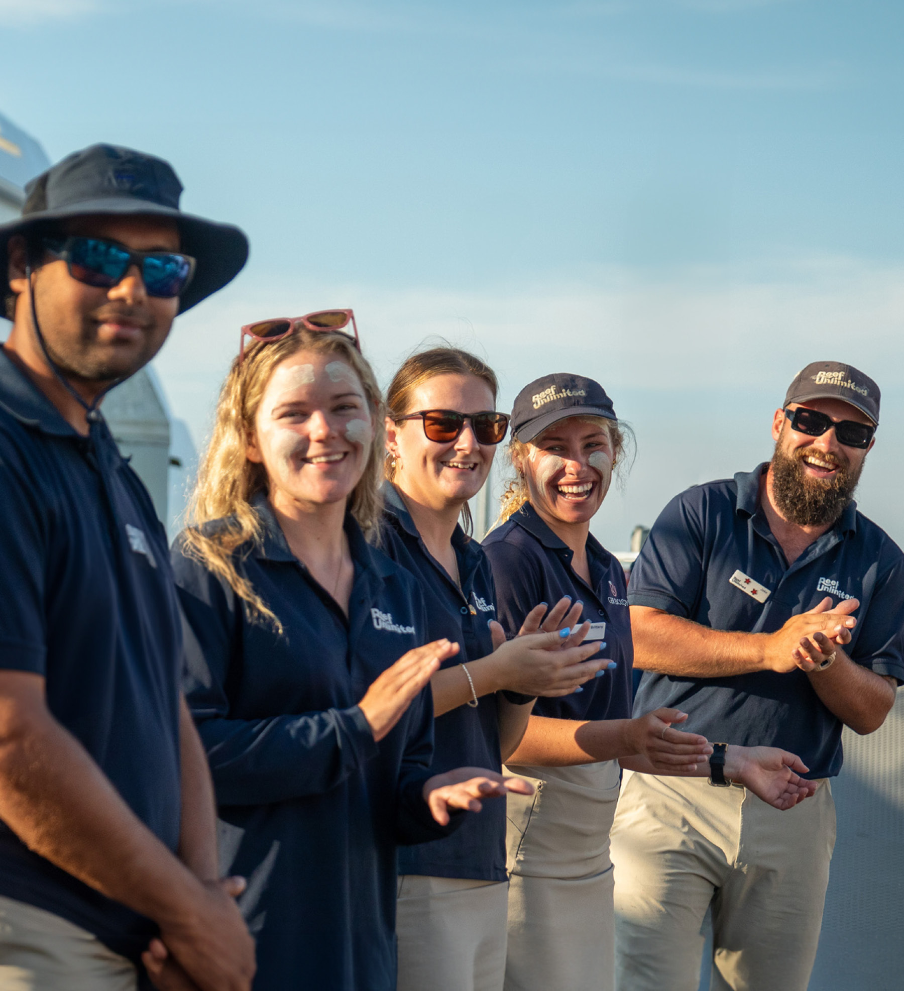 Reef Unlimited Staff Clapping